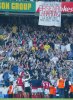 Arsenal fans applaud their team after winning the title at White Hart Lane on April 25, 2004.jpg