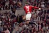 22-Cantona-flying.jpg