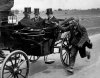 Beggar-running-alongside-a-horse-and-carriage-634x500.jpg